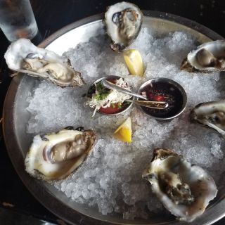 Restaurant Orsay - Grand Plateau: Gulf Coast oysters, marinated calamari,  chilled poached shrimp, P.E.I. mussels, King crab, scallop tartare, West &  East Coast oysters, a whole butter poached lobster, crudo, & Oyster's