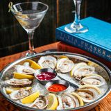 $8 Martini & Buck-a-Shuck Oysters Monday photo